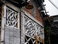 the exterior of the house made of bamboo that is not maintained