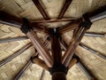 Bamboo umbrella structure with woven ceiling in a tropical setting view Royalty Free Stock Photo
