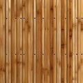 Bamboo veneer vertical slats create rhythmic pattern with thin gaps, showcasing natural and elegant design. warm tones and texture Royalty Free Stock Photo