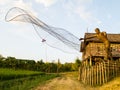 Bamboo weave model of Thai fisherman. Royalty Free Stock Photo