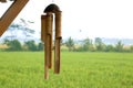 Bamboo wind chimes hanging on the hut Royalty Free Stock Photo