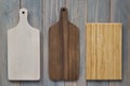 Bamboo wood cutting board on a wooden gray background Royalty Free Stock Photo