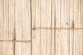 Bamboo wood texture wall fence with vertical seamless patterns light brown background Royalty Free Stock Photo