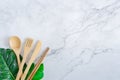 Bamboo wood toothbrush on clean white marble table top view background concept for save the earth day, world environmental, Royalty Free Stock Photo