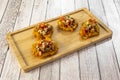 Bamboo wood tray with recipe Venezuelan plantain patacones like Royalty Free Stock Photo