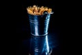 bamboo wooden toothpicks in glass jar, wine glass. in bucket. toothpicks on black background. front view toothpicks, dropped from Royalty Free Stock Photo