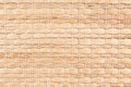 Bamboo woven beige mat handmade background. Royalty Free Stock Photo