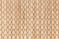 Bamboo woven beige mat handmade background. Royalty Free Stock Photo