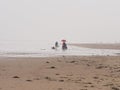 Bamburgh beach in rain