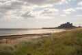 Bamburgh castle coast and beach in summer