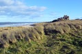 Bamburgh Castle from over the dunes, England Royalty Free Stock Photo