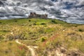 Bamburgh Castle Northumberland on a hill in hdr