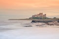 Bamburgh Castle in Northumberland at sunset - view from the beach