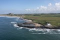 Bamburgh Castle and village from Harkness Rocks Royalty Free Stock Photo