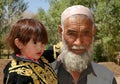 A old man with young child in Bamiyan, Afghanistan Royalty Free Stock Photo