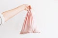 Ban single use plastic. Woman holding in hand groceries in reusable eco bag. Zero Waste shopping concept. Choose eco friendly Royalty Free Stock Photo