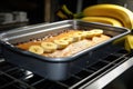 banan cake baking in the oven, with the sweet and fruity smell filling the kitchen