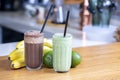 Banana & Avocado Fresh Smoothie on Table Royalty Free Stock Photo