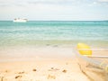 Banana Boat on Sand Beach at Coast with Blue Sea Royalty Free Stock Photo