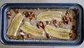 banana bread baked with pieces of sliced ??bananas on a baking Royalty Free Stock Photo