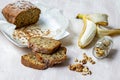 Banana Bread composition with walnuts, banana fruit and glass of milk Royalty Free Stock Photo