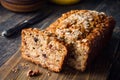 Banana bread loaf with oats, walnuts and chocolate Royalty Free Stock Photo