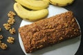 Banana bread made with wholewheat flour and coconut oil. Baked with cinnamon, sugar and walnut for a crunchy top Royalty Free Stock Photo