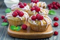 Banana bread muffins with raspberries, cherries and white chocolate, horizontal Royalty Free Stock Photo