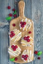 Banana bread muffins with raspberries, cherries, white chocolate, top view Royalty Free Stock Photo