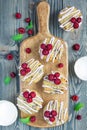 Banana bread muffins with raspberries, cherries, white chocolate, top view Royalty Free Stock Photo