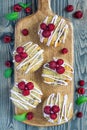 Banana bread muffins with raspberries, cherries, white chocolate, top view Royalty Free Stock Photo