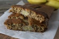 Banana bread with oat flour. Top view of homemade banana bread on wooden background. Ideas and recipes for healthy diet breakfast Royalty Free Stock Photo