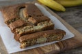 Banana bread with oat flour. Top view of homemade banana bread on wooden background. Ideas and recipes for healthy diet breakfast Royalty Free Stock Photo