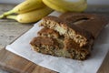 Banana bread with oat flour. Top view of homemade banana bread on wooden background. Ideas and recipes for healthy diet breakfast Royalty Free Stock Photo