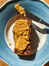 Banana Bread Slice with Creamy Peanut Butter Cream Paste Royalty Free Stock Photo