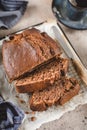 Banana bread sliced with coffee. Vegan pasrty. Home bakery concept. Close-up