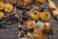 The bakery set consists of banana cake with almond topping, and bread sprinkled with black sesame seeds. Placed on a steel grid, D Royalty Free Stock Photo