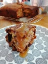 Banana cake with sultanas and chocolate chip and salted caramel sauce Royalty Free Stock Photo