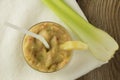 Banana and celery smoothie with berries on wooden table top view Royalty Free Stock Photo