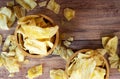 Banana chips in wooden bowl Royalty Free Stock Photo