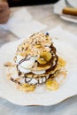 Banana chocolate almond on fluffy soft pancake Royalty Free Stock Photo