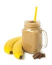 Banana chocolate smoothie in a glass jar Isolated on a white background Royalty Free Stock Photo