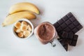 Banana and chocolate smoothie in the glass jar milkshakes, natural and organic drink Royalty Free Stock Photo