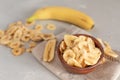 Banana - This is a close up shot of a bowl full of dried banana chips. Shot with a shallow depth of field and vignetting Royalty Free Stock Photo