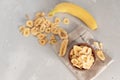 Banana - This is a close up shot of a bowl full of dried banana chips. Shot with a shallow depth of field and vignetting Royalty Free Stock Photo