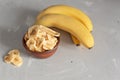 Banana - This is a close up shot of a bowl full of dried banana chips. Shot with a shallow depth of field and vignetting Royalty Free Stock Photo