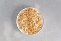 Banana - This is a close up shot of a bowl full of dried banana chips. Shot with a shallow depth of field and vignetting Royalty Free Stock Photo