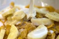 Banana with corn flakes Royalty Free Stock Photo