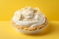 Small banana cream pie on yellow background