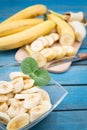 Banana daiquiri in glass and bananas Royalty Free Stock Photo